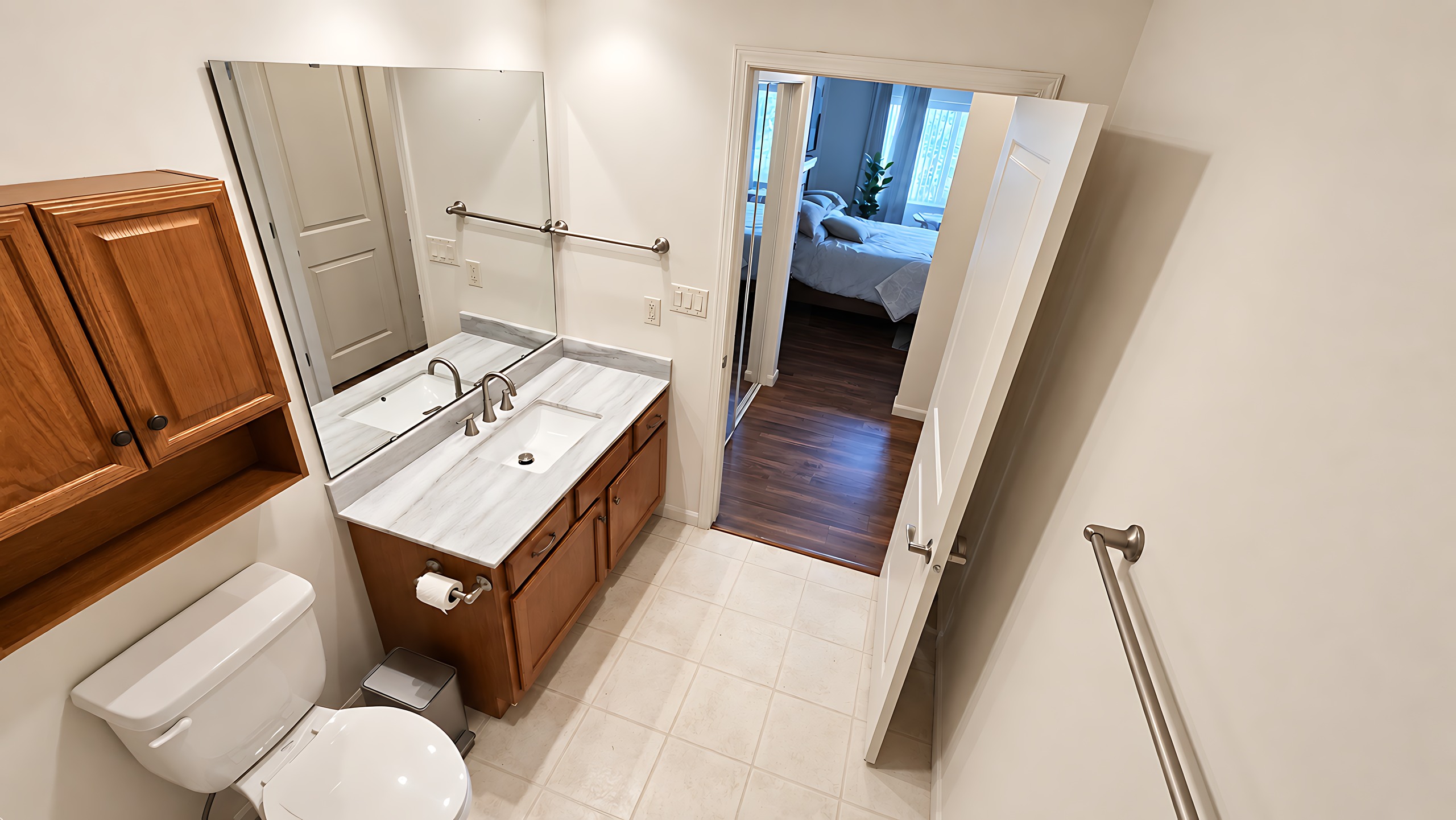 Primary bathroom, vanity and bedroom, Unit 416